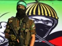 A member of the Ezzedine al-Qassam Brigades, the military wing of the Palestinian Islamist movement Hamas, attends an anti-Israel rally in Gaza City on April 28, 2016.