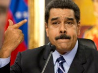 Venezuela's President Nicolas Maduro speaks during a press conference at the Miraflores presidential palace in Caracas, Venezuela, Tuesday, May 17, 2016. Maduro accused the United States of sabotage plans against Venezuela, saying they aim to create a scenario of violence to justify a foreign military intervention to remove him from power. (AP Photo/Ariana Cubillos)