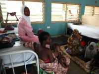 NIGERIA, Yola : Women and children rescued by Nigerian soldiers from Islamist militants Boko Haram at Sambisa Forest wait to receive treatment at the Federal Medical Centre in Yola on May 5, 2015. They were among a group of 275 people rescued by the Nigerian military last week and arrived at the camp on May 2. The Nigerian military said it has rescued some 700 women and children in the past weeks. AFP PHOTO / EMMANUEL AREWA