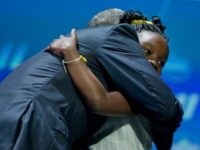 Barack Obama hugs Mikaila Ulmer after being introduced at the White House Summit on the United State of Woman, Tuesday, June 14, 2016 in Washington. The White House hosted the event to mark the progress made by and for women and girls domestically and internationally over the course of Obama's administration and to discuss solutions to the challenges they still face. (