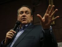 Republican presidential candidate, former Arkansas Gov. Mike Huckabee speaks at Inspired Grounds Cafe, Sunday, Jan. 31, 2016, in West Des Moines, Iowa. (AP Photo/Kiichiro Sato)