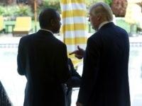 Former Republican presidential candidate Ben Carson, left, speaks with Republican presidential candidate Donald Trump after a news conference at the Mar-A-Lago Club, Friday, March 11, 2016, in Palm Beach, Fla.