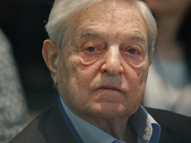 WASHINGTON, DC - APRIL 17: Soros Fund Management Chairman George Soros attends a meeting with finance and development ministers, international partners and the presidents of Liberia, Sierra Leone and Guinea about the ongoing efforts to recover from the Ebola outbreak in West Africa during the World Bank- International Monetary Fund Spring Meetings April 17, 2015 in Washington, DC. The World Bank announced Friday that it would provide an additional US$650 million over the next year to help Guinea, Liberia and Sierra Leone to recover from the social, economic and health impact of the Ebola crisis. (Photo by Chip Somodevilla/Getty Images)