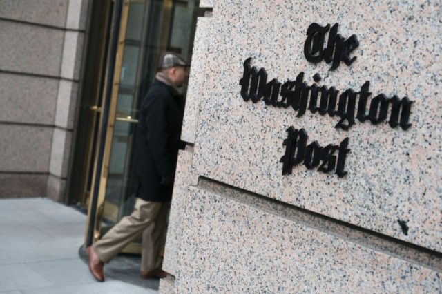 A man walks into the Washington Post's new building March 3, 2016 in Washington, DC.
A view of the Washington Post's new building March 3, 2016 in Washington, DC. / AFP / Brendan Smialowski        (Photo credit should read BRENDAN SMIALOWSKI/AFP/Getty Images)