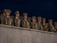Military officers attend a torchlight parade on Kim Il-Sung square during festivities marking the end of the 7th Workers Party Congress in Kim Il-Sung square in Pyongyang on May 10, 2016.