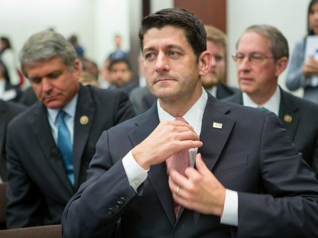 House Speaker Paul Ryan, (R-WI) adjusts his tie before a session on 'Protecting the U.S. Homeland' at The Council on Foreign Relations on June 9, 2016, in Washington, D.C.