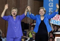 CINCINNATI, OH- JUNE 27:  Democratic Presidential candidate Hillary Clinton (L) and U.S. Sen Elizabeth Warren (D-MA) (R) wave to the crowd before a campaign rally at the Cincinnati Museum Center at Union Terminal June 27, 2016 in Cincinnati, Ohio. Warren is helping Clinton campaign in Ohio.   (Photo by John Sommers II/Getty Images)
