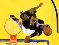 OAKLAND, CA - JUNE 19:  LeBron James #23 of the Cleveland Cavaliers blocks a shot by Stephen Curry #30 of the Golden State Warriors in Game 7 of the 2016 NBA Finals at ORACLE Arena on June 19, 2016 in Oakland, California. NOTE TO USER: User expressly acknowledges and agrees that, by downloading and or using this photograph, User is consenting to the terms and conditions of the Getty Images License Agreement.  (Photo by John Mabanglo/Pool/Getty Images)
