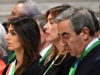 The new Mayor of Rome Virginia Raggi (L) and Italy's Minister for Constitutional Reforms and Relations with the Parliament Maria Elena Boschi (C) arrive at the Basilica of Saint John Lateran for the jubilee celebration mass on June 22, 2016 in Rome. / AFP / ALBERTO PIZZOLI        (Photo credit should read ALBERTO PIZZOLI/AFP/Getty Images)