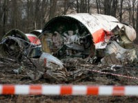 FILE - This is a Sunday, April 11, 2010 file photo of the wreckage of the Polish presidential plane which crashed early Saturday in Smolensk, western Russia. A Polish court Tuesday June 21, 2016 has convicted and handed a suspended prison term to Pawel Bielawny a former deputy head of government security over the 2010 plane crash that killed President Lech Kaczynski and 95 others. (AP Photo/Sergey Ponomarev, File)