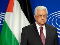 President of the Palestinian National Authority Mahmud Abbas poses for photographs at the European Parliament in Brussels on June 23, 2016.