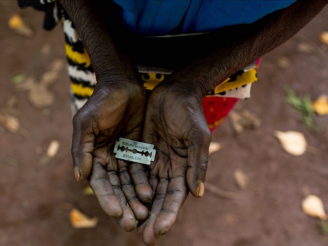 *** EXCLUSIVE *** MOMBASA, KENYA - JUNE 25: Cutter Anna-Moora Ndege shows the razorblade she uses to cut girls genitals , on June 25, 2015, in Mombasa, Kenya. THESE are the rudimentary tools used to cut young girls sexual organs in remote villages in Kenya. The cruel practice of female genital mutilation (FGM) is illegal in the UK and in dozens of countries in Africa. But in remote Kenyan villages and communities far from the capital, Nairobi, the practice is very much alive and well. PHOTOGRAPH BY Ivan Lieman / Barcroft Media (Photo credit should read Ivan Lieman / Barcroft Media via Getty Images)