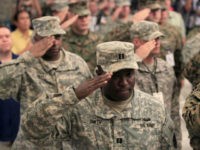 U.S. troops salute during the opening ceremony of the 2015 Balikatan exercises between the Philippines and U.S. at the Armed Forces of the Philippines (AFP) headquarters in Camp Aguinaldo, metro Manila April 20, 2015. REUTERS/ROMEO RANOCO