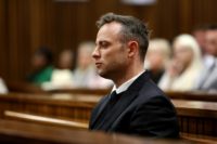 South African paralympian Oscar Pistorius looks on during the third day of his hearing at the Pretoria High Court on June 15, 2016