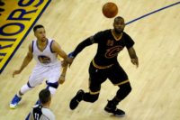 Stephen Curry (L) of the Golden State Warriors looks for the rebound against LeBron James of the Cleveland Cavaliers in Game 5 of the 2016 NBA Finals, at ORACLE Arena in Oakland, California, on June 13