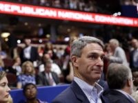 Former Attorney General of Virginia Ken Cuccinelli walks around the convention floor during first day of the Republican National Convention in Cleveland, Monday, July 18, 2016. (AP Photo/Matt Rourke)