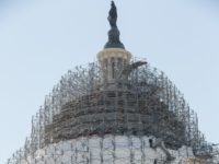 Scaffolding still wraps around the Senate and the Capitol Dome as part of a long-term repair project, but some of it has been removed from the very top of the structure around the Statue of Freedom, in Washington, Wednesday, March 9, 2016. The rest of the work, including restoration to the interior of the rotunda, will be completed before the 2017 presidential inauguration. (