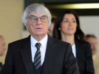 Formula One boss Bernie Ecclestone and his wife Fabiana Flosi leaves the court room of the district court in Munich, Germany, 13 May 2014. Ecclestone stands accused of paying former member of the board of BayernLB 44 million euros in bribes and taking a huge part of that sum back from BayernLB as a consultant's commission. Photo by: Andreas Gebert/picture-alliance/dpa/AP Images
