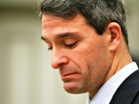 Virginia Attorney General Ken Cuccinelli gets choked up as he announces the exoneration of Thomas Hanesworth during a press conference in Richmond, Va., Tuesday, Dec. 6, 2011.  Haynesworth spent 27 years in prison for two 1984 sexual assault convictions.  (AP Photo/Steve Helber)