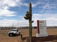 ELOY, AZ - JULY 30: A cactus and sign mark the entrance to the Eloy Detention Facility for illegal immigrants on July 30, 2010 in Eloy, Arizona. Most immigrants at the center, operated by the Corrections Corporation of America (CCA), are awaiting deportation or removal and return to their home countries, while some are interned at the facility while their immigration cases are being reviewed. The U.S. Immigration and Customs Enforcement (ICE), in Arizona holds almost 3,000 immigrants statewide, all at the detention facilities in  Eloy and nearby Florence. Arizona, which deports and returns more illegal immigrants than any other state, is currently appealing a judge's ruling suspending controversial provisions of Arizona's immigration enforcement law SB 1070.  (Photo by John Moore/Getty Images)