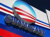Obamacare sign is seen on the UniVista Insurance company office on December 15, 2015 in Miami, Florida.