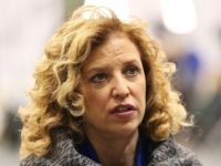 U.S. Representative Debbie Wasserman Schultz (D-FL 23rd District) and chair of the Democratic National Committee (DNC) speaks to a reporter before the democratic debate on December 19, 2015 in Manchester, New Hampshire. The DNC has been criticized for the timing of democratic debates during the 2016 presidential race. (Photo by Andrew Burton/Getty Images)