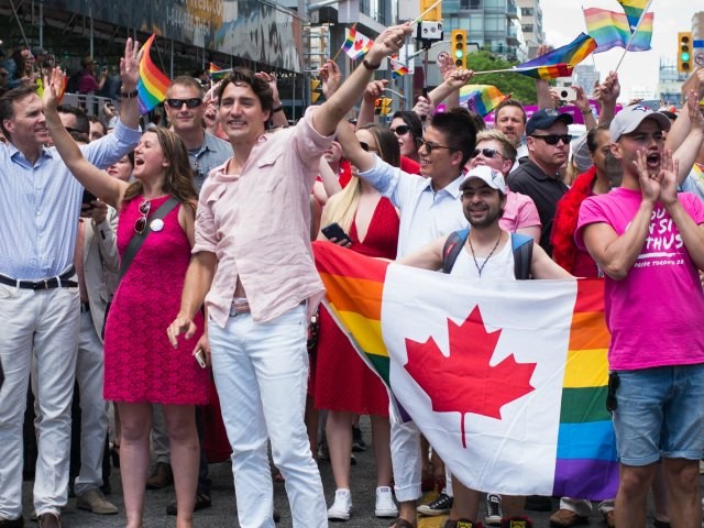 Justin Trudeau Marches With Syrian Refugee At Toronto Gay Pride Parade Breitbart