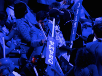 Obama signs (Andrew Harnik / Associated Press)