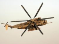 An Israeli air force CH-53 Sea Stallion heavy-lift transport helicopter (also known as the Sikorsky S-65 or 'Yasur' in Hebrew) banks in the air during an air show at a graduation ceremony for Israeli air force pilots at the Hazerim air force base near the southern Israeli city of Beersheva on June 24, 2008. AFP PHOTO/JONATHAN NACKSTRAND (Photo credit should read JONATHAN NACKSTRAND/AFP/Getty Images)