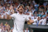 Britain's Andy Murray reacts while playing Canada's Milos Raonic during the men's singles final match on the last day of the 2016 Wimbledon Championships at The All England Lawn Tennis Club in Wimbledon, southwest London, on July 10, 2016