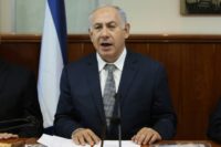 Israeli Prime Minister Benjamin Netanyahu opens the weekly cabinet meeting at his Jerusalem's office on July 3, 2016
