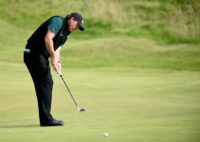 US golfer Phil Mickelson putts on the 15th Green during his first round 63 on the opening day of the 2016 British Open Golf Championship at Royal Troon in Scotland on July 14, 2016
