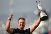 Sweden's Henrik Stenson poses for pictures with the Claret Jug at Royal Troon in Scotland on July 17, 2016