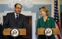 Secretary of State Hillary Rodham Clinton, right, smiles at Iraqi Prime Minister Nouri al-Maliki as they talk with reporters during a news conference at the State Department  in Washington, Friday, July 24, 2009. (AP Photo/Pablo Martinez Monsivais)