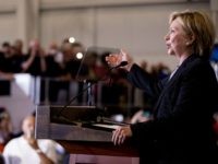 Democratic presidential candidate Hillary Clinton gives a speech on the economy after touring Futuramic Tool & Engineering, in Warren, Mich., Thursday, Aug. 11, 2016. (