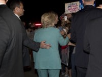 Democratic presidential nominee Hillary Clinton is surrounded by members of her Secret Service detail as she greets people before leaving a fundraiser in Piedmont, Calif., Tuesday, Aug. 23, 2016. (AP Photo/Carolyn Kaster)