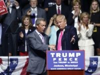 Republican presidential candidate Donald Trump welcomes Nigel Farage, ex-leader of the British UKIP party, to speak at a campaign rally in Jackson, Miss., Wednesday, Aug. 24, 2016. (AP Photo/Gerald Herbert)