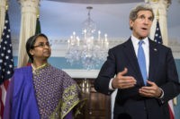 Bangladeshi Foreign Minister Dipu Moni and US Secretary of State John Kerry speak at the US State Department May 17, 2013 in Washington, DC. AFP PHOTO/Brendan SMIALOWSKI        (Photo credit should read BRENDAN SMIALOWSKI/AFP/Getty Images)