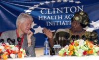 Malawi's President Joyce Banda speaks during a press conference with former US President Bill Clinton on August 1, 2013 at the Kamuzu Central Hospital Laboratory in Lilongwe which is supported by the Clinton Health Access Initiative on the second day of his two-day private visit to Malawi. Clinton is in Malawi to discuss non-profit projects sponsored by the Clinton and Hunter Foundation. AFP PHOTO / AMOS GUMULIRA        (Photo credit should read AMOS GUMULIRA/AFP/Getty Images)