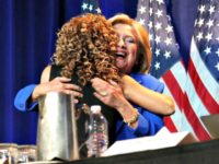 Hillary Hugs Debbie AP