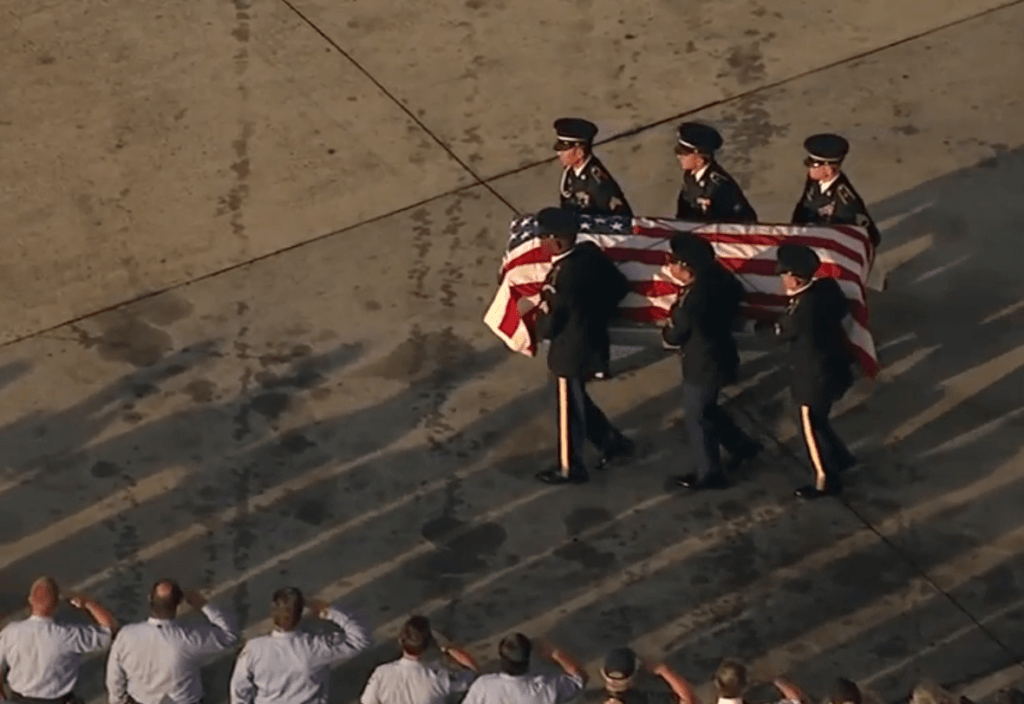 Army honor guard escorts the remains of Flight Officer Judon Baskett after arriving at George Bush Intercontinental Airport in Houston. (Photo: KTRK ABC13 Video Screenshot)