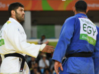 Israel's Or Sasson (white) competes with Egypt's Islam Elshehaby during their men's +100kg judo contest match of the Rio 2016 Olympic Games in Rio de Janeiro on August 12, 2016. / AFP / Toshifumi KITAMURA (Photo credit should read TOSHIFUMI KITAMURA/AFP/Getty Images)
