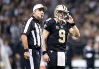 NEW ORLEANS, LA - DECEMBER 21: Drew Brees #9 of the New Orleans Saints looks at a replay with Referee Pete Morelli during a game against the Detroit Lions at the Mercedes-Benz Superdome on December 21, 2015 in New Orleans, Louisiana. (Photo by Sean Gardner/Getty Images)