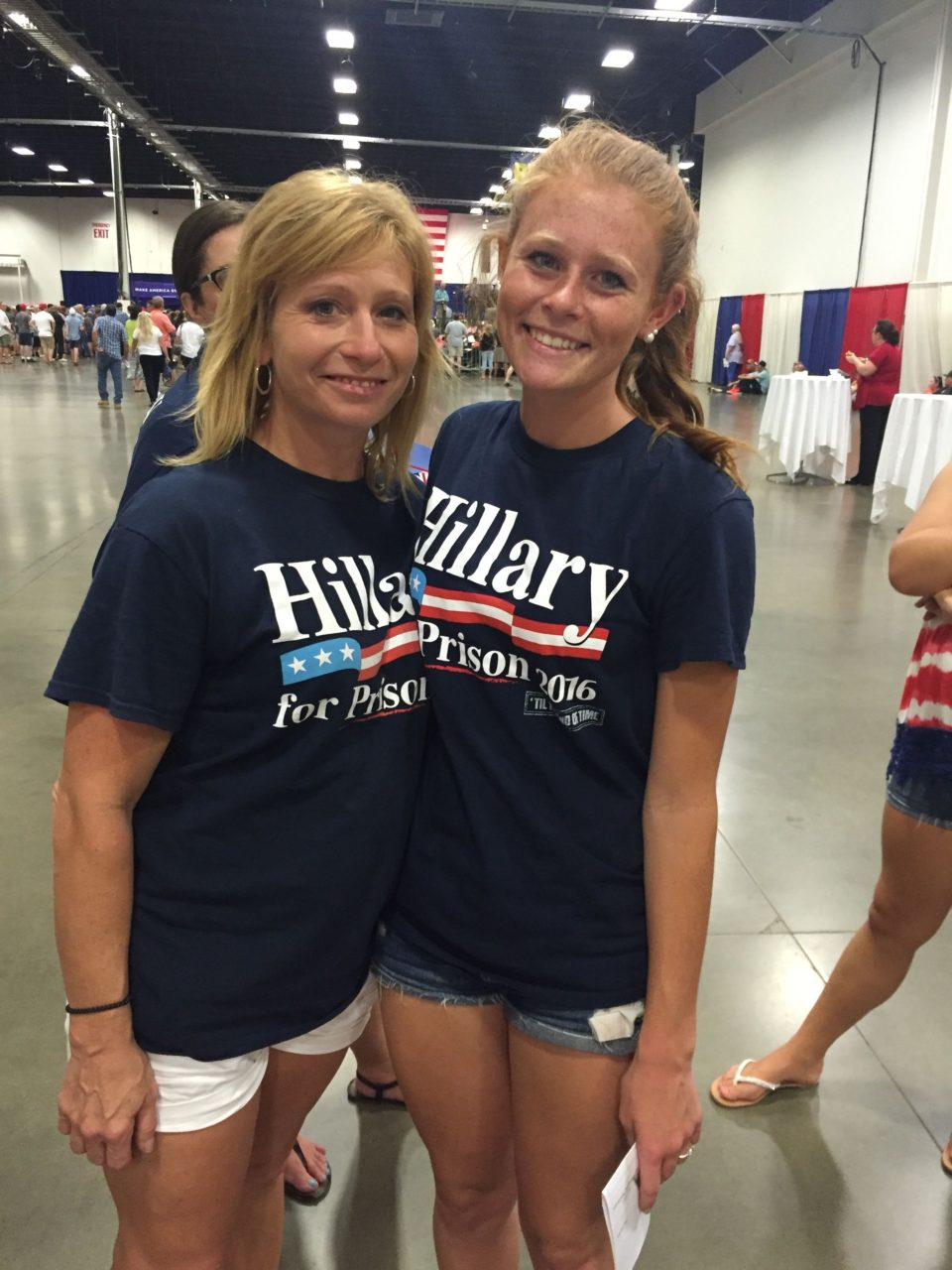 Two girls in Hillary For Prison shirts