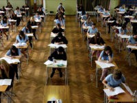 Sats test results for 11-year-olds due out.File photo dated 11/06/08 of pupils sitting an exam. Results of national curriculum tests taken by England's 11-year-olds will be published today. Issue date: Tuesday August 4, 2009. They will show how well pupils are performing in English, maths and science. The Liberal Democrats predicted the results would reveal that more than half a million children have left primary school unable to read or write since Labour came to power in 1997. See PA story EDUCATION Sats. Photo credit should read: Chris Radburn/PA Wire URN:7666034 (Press Association via AP Images)