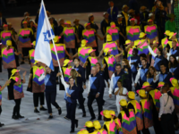 RIO DE JANEIRO, BRAZIL - AUGUST 05: Neta Rivkin of Israel carries the flag during the Opening Ceremony of the Rio 2016 Olympic Games at Maracana Stadium on August 5, 2016 in Rio de Janeiro, Brazil. (Photo by Clive Brunskill/Getty Images)