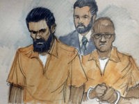 \FILE - In this March 26, 2015 file courtroom sketch, Jonas Edmonds, left, and his cousin Hasan Edmonds, right, stand in front of an FBI agent as they appear at a hearing at federal court in Chicago following their arrests on charges of conspiring with the Islamic State group. Prosecutors say the two plotted to carry out a terrorist attack in the United States. Jonas Edmonds is scheduled to be sentenced on Wednesday, Jan. 27, 2016 in Chicago. His cousin, Hasan, pleaded guilty to similar counts. He will be sentenced later. (AP Photo/Tom Gianni, File)