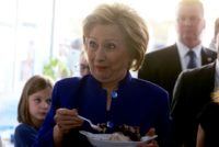 Democratic US presidential nominee, former Secretary of State Hillary Clinton samples ice cream at 'Mikey Likes It Ice Cream' in New York, in April 2016
