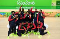 From L: The members of the USA men's basketball team celebrate with their gold medals