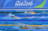 Swimmers train at the Olympic Aquatics Stadium ahead of the Rio 2016 Olympic Games in Rio de Janeiro on August 4, 2016